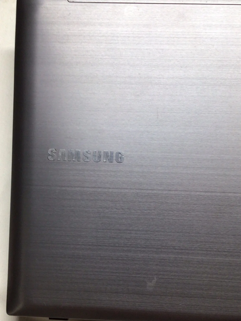 Samsung Silver and Black Laptop with Windows 7 Setup Screen